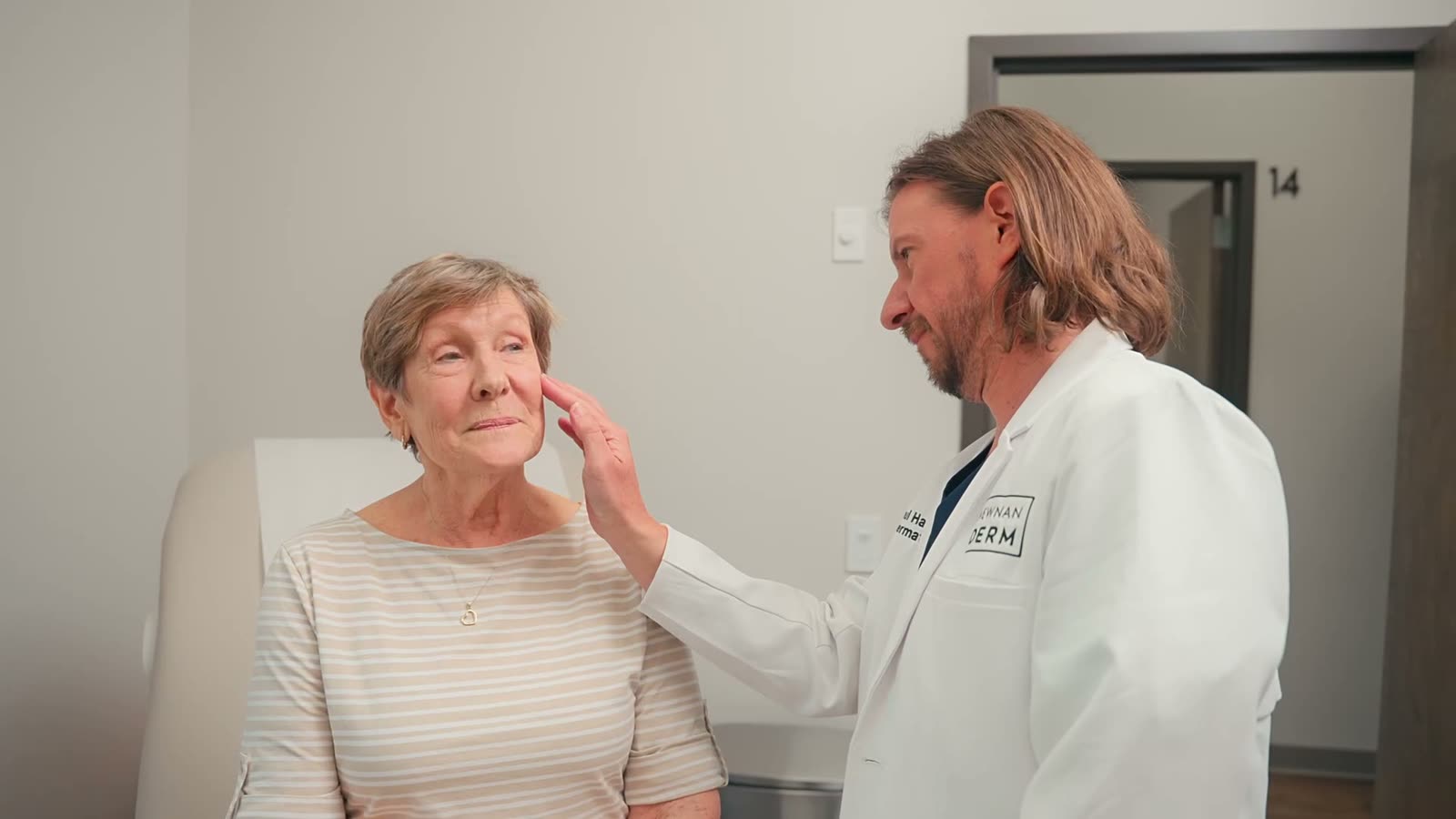 Dr. Paul Haun with a patient at West Georgia Dermatology