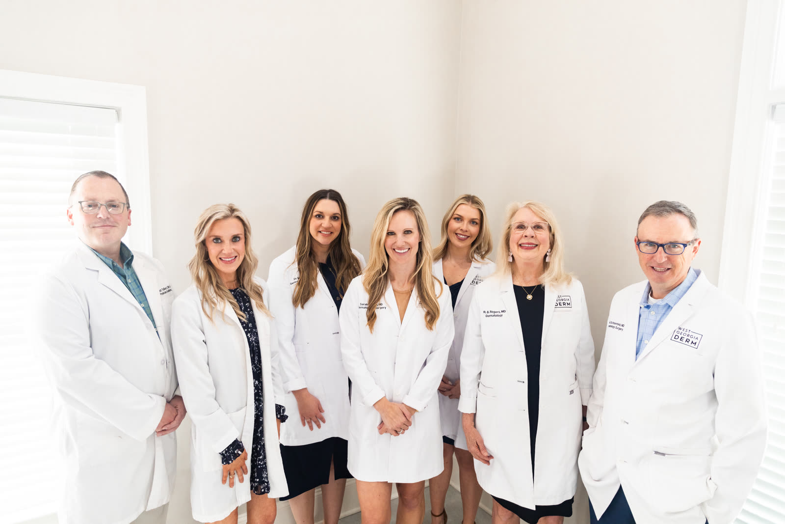 The West Georgia Dermatology physicians and physician assistants in white coats